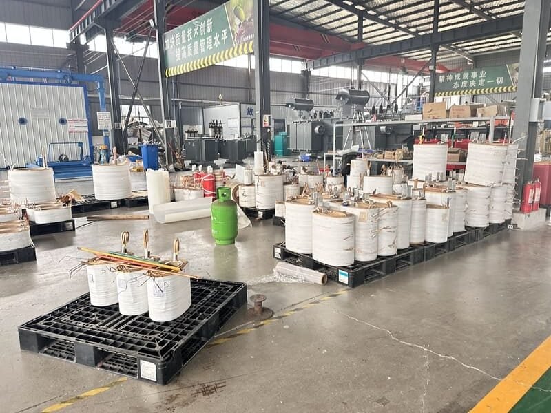 Internal Components of a Transformer Core and Windings Close-up of a large power transformer with visible windings and core structure